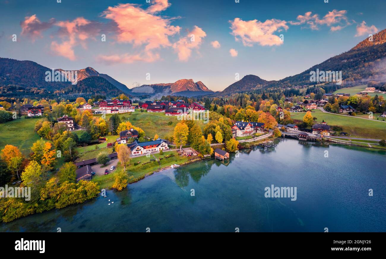 Splendid autumn view from flying drone of Grundlsee lake. Amazing morning scene of Eastern Alps, Liezen District of Styria, Austria, Europe. Aerial ci Stock Photo