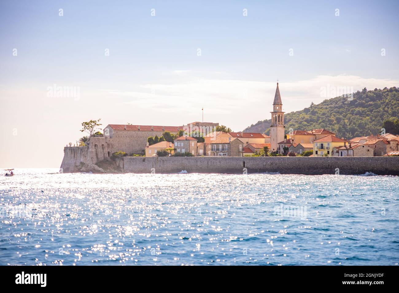 View from water of the old town of Budva city in Montenegro, view from island of St. Nicholas Stock Photo
