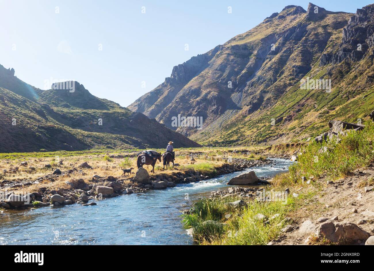 Gauchos in Patagonia mountains, Argentina Stock Photo