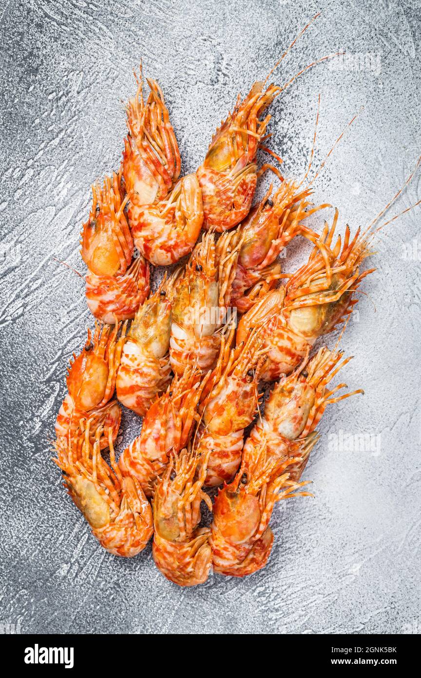 Raw Greenland Prawn Shrimp on a kitchen table. White background