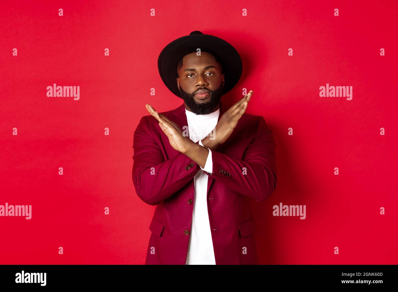 Image of serious Black man strongly disagree, showing cross sign to ...