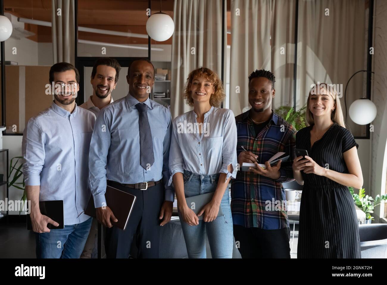 Portrait of happy successful diverse business team Stock Photo