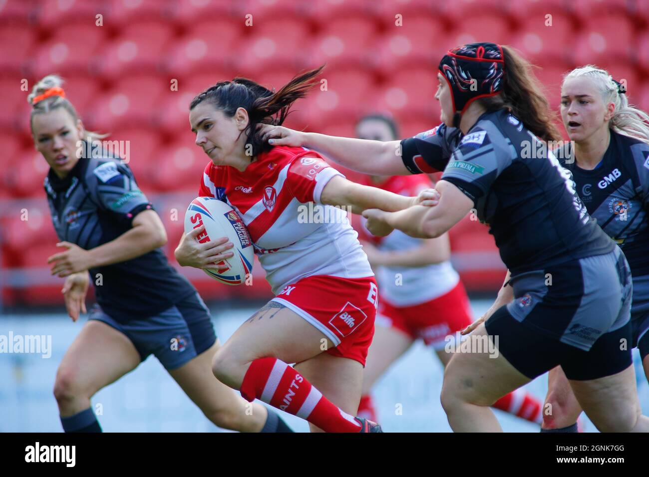 St Helens, UK. 26th Sep, 2021. Totally Wicked Stadium, Saint Helens, 26th September 2021 Betfred Women's Super League Semi-Final St Helens vs Castleford Tigers Women Carrie Roberts of St Helens makes a break on her way to score against Castleford Tigers Women Credit: Touchlinepics/Alamy Live News Stock Photo