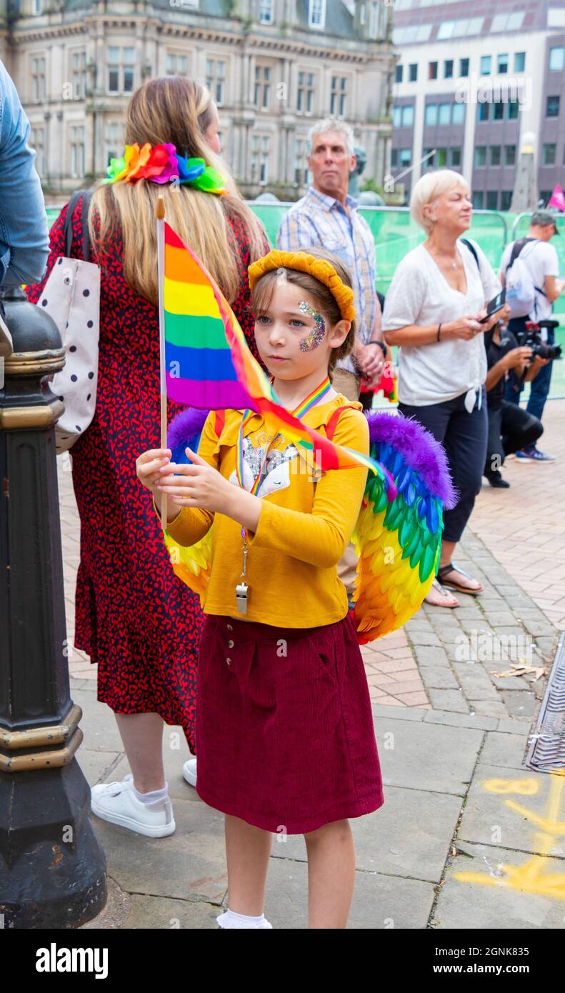young girl waving rainbow flag at Birmingham Pride Saturday 25th September 2021 Stock Photo
