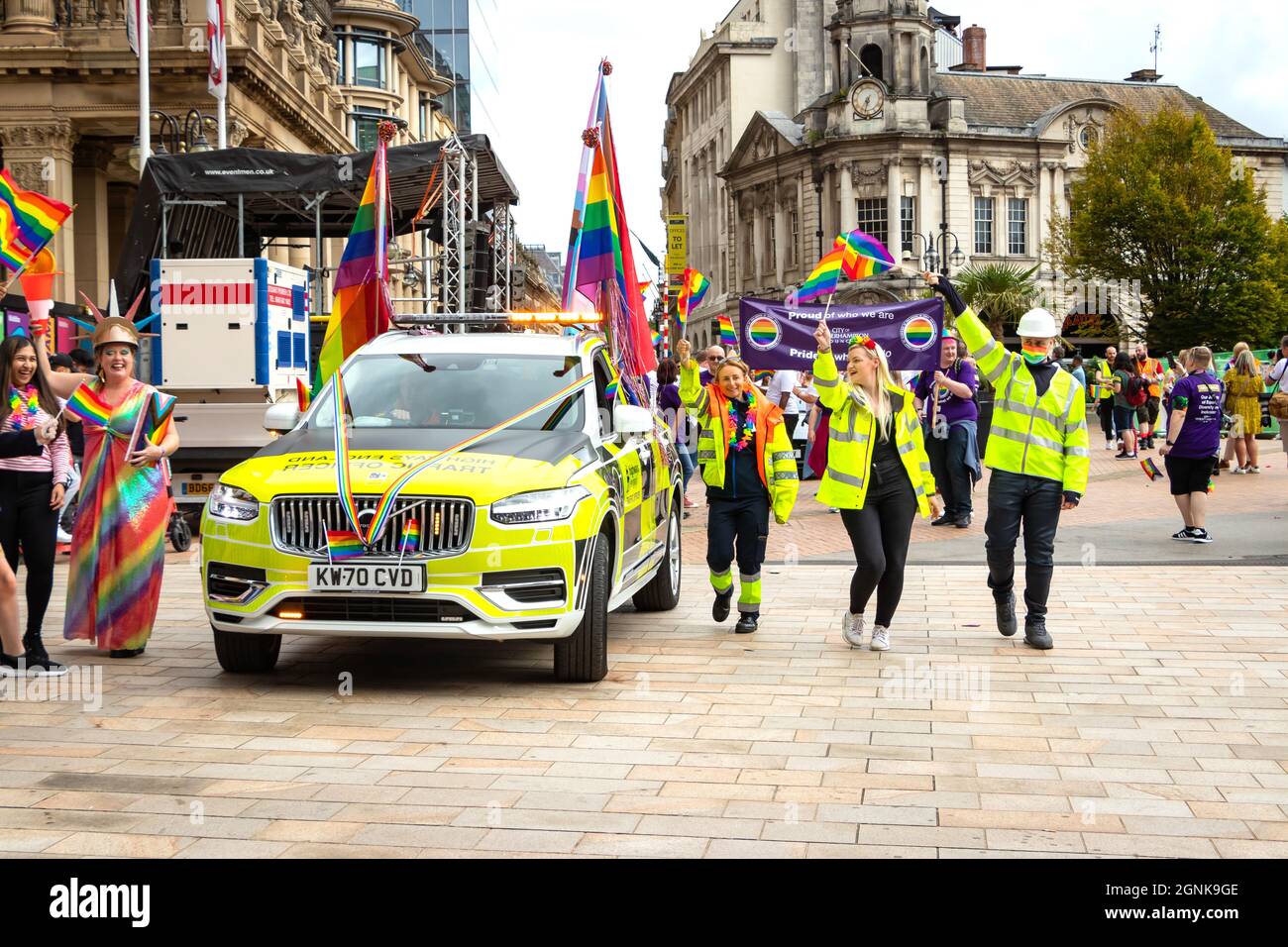 highways England volvo car and staff waving rainbow flags and wearing fluorescent clothing at Birmingham Pride Saturday 25th September 2021 Stock Photo