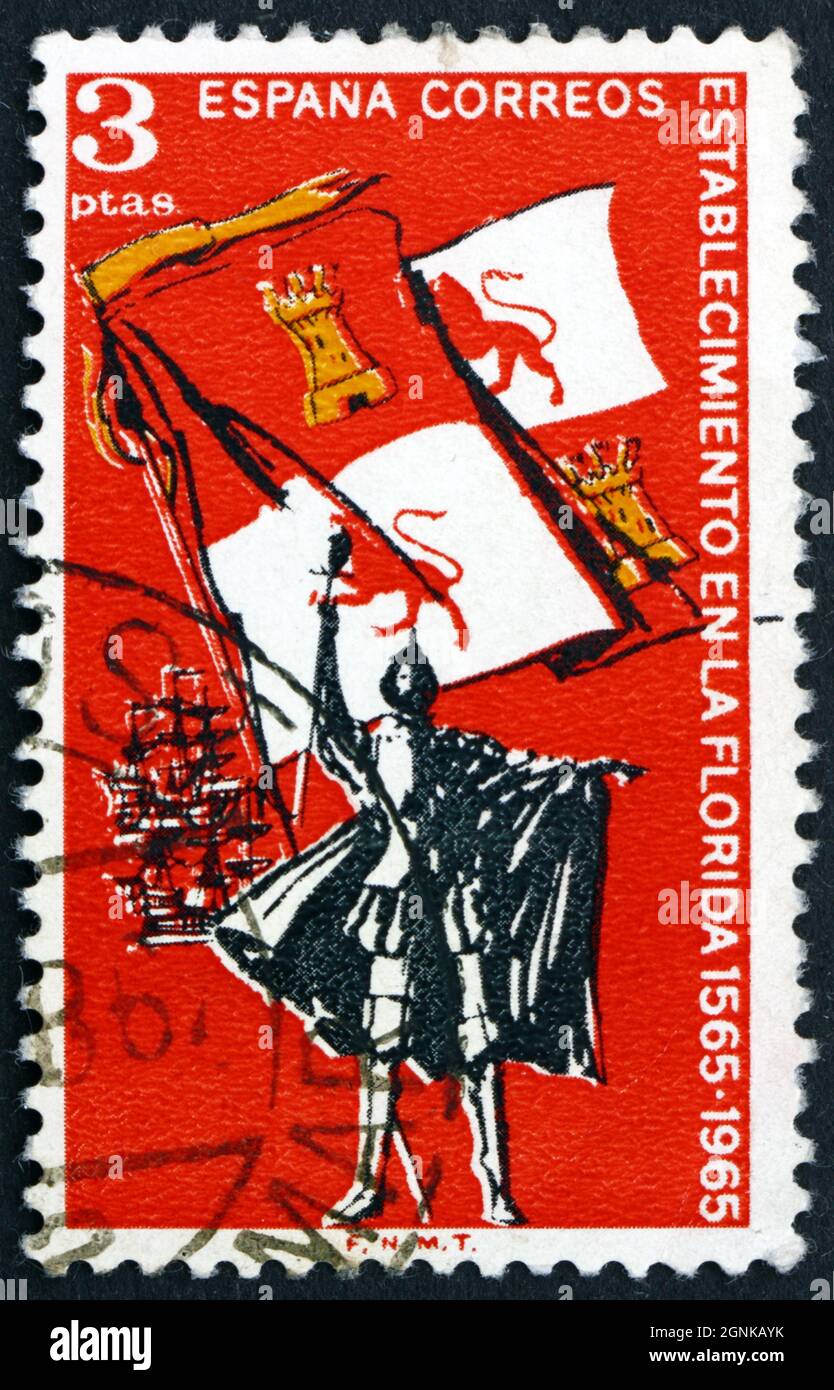 SPAIN - CIRCA 1965: a stamp printed in Spain shows Explorer, Royal Flag of Spain and Ships, 400th Anniversary of the Settlement of Florida, circa 1965 Stock Photo