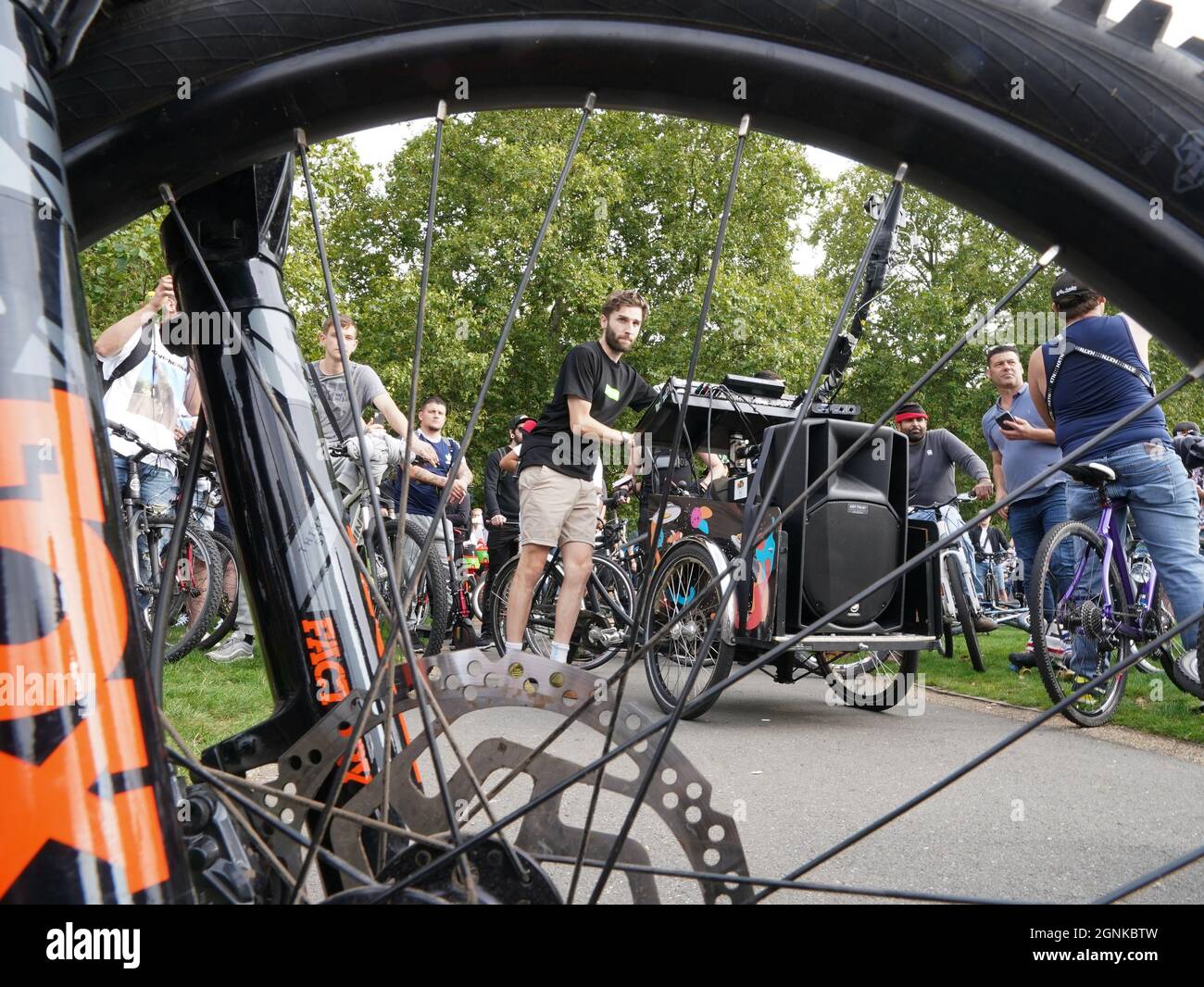 DJ Dom Whiting plays music on his bike as he cycles through Hyde Park
