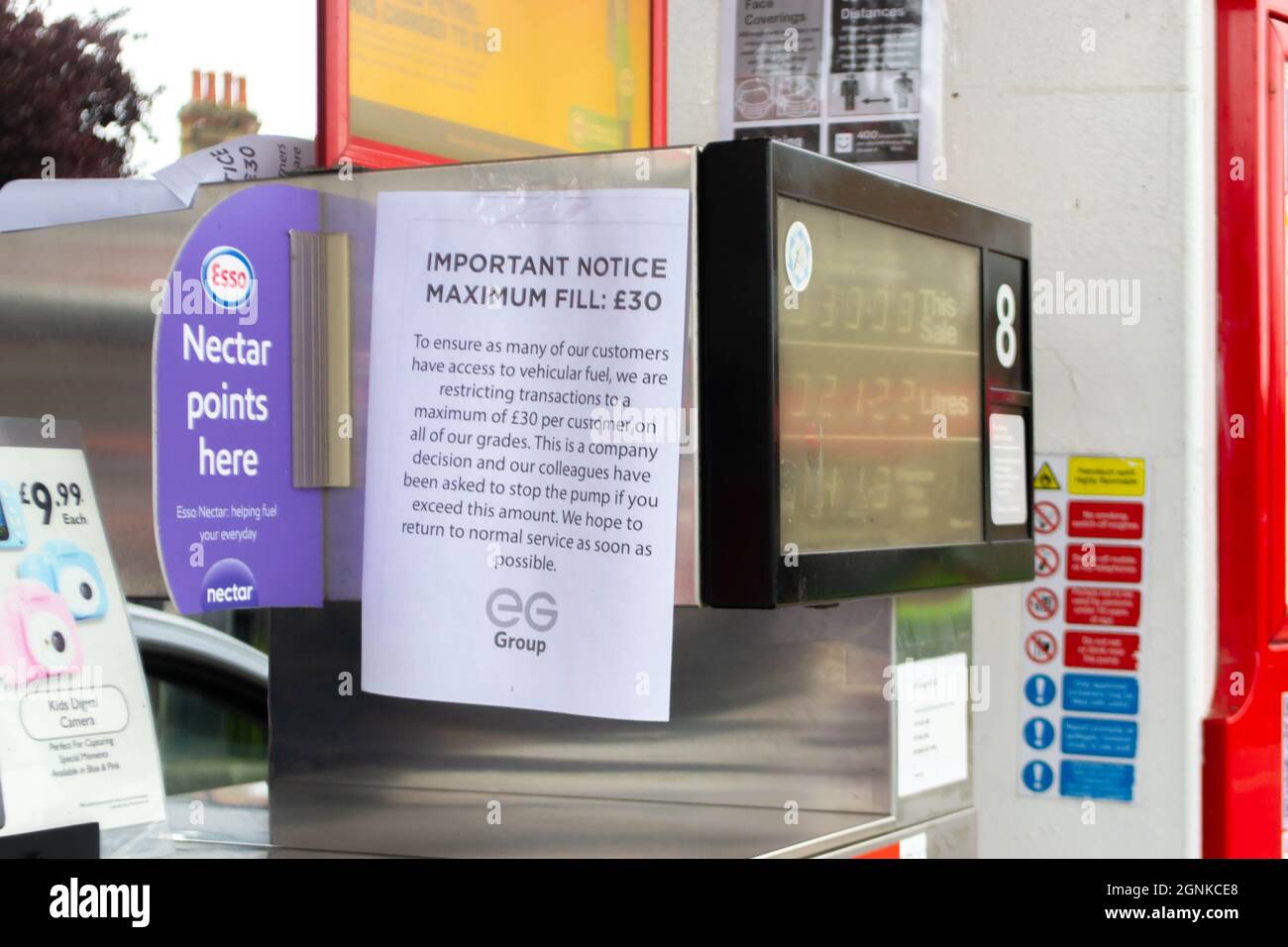 DENHAM, ENGLAND - 25 September 2021: Esso petrol station limiting purchases to £30 amid fuel shortage crisis Stock Photo