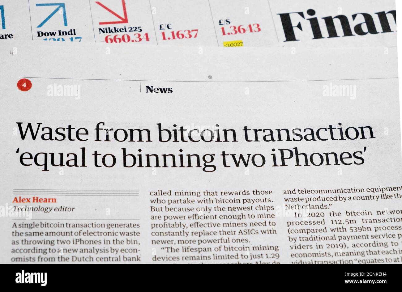 "Waste from bitcoin transaction 'equal to binning two iPhones' Guardian  newspaper headline Bitcoin iPhones article on 17 September 2021 London UK Stock Photo