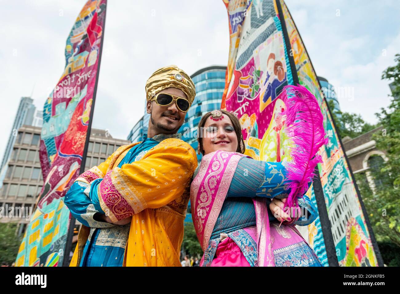 London, UK. 26th Sep, 2021. Costumed stilt walkers taking part in Mela