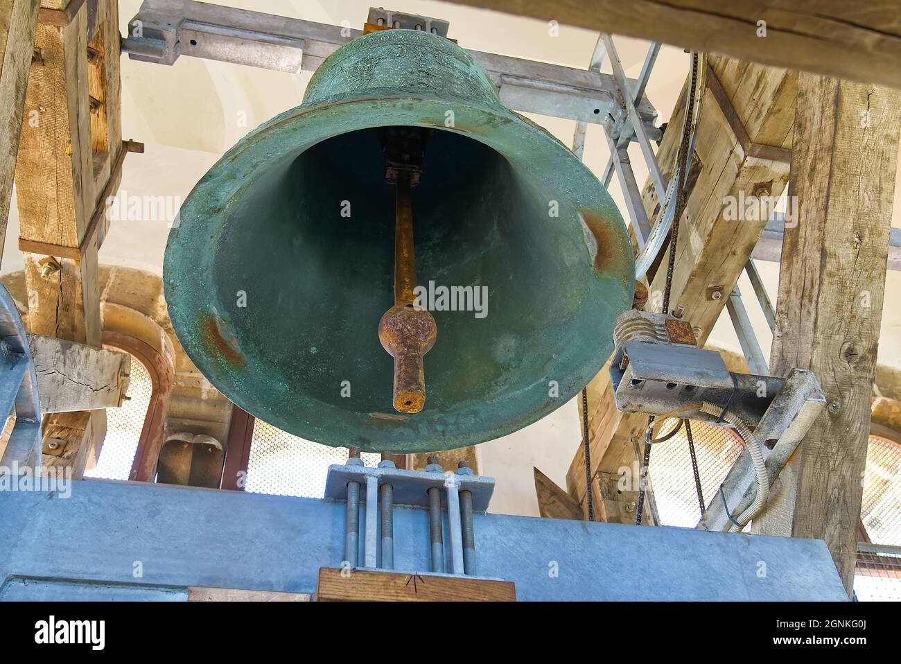 Middle age Traditional old bells in a church tower. Bell and mounting