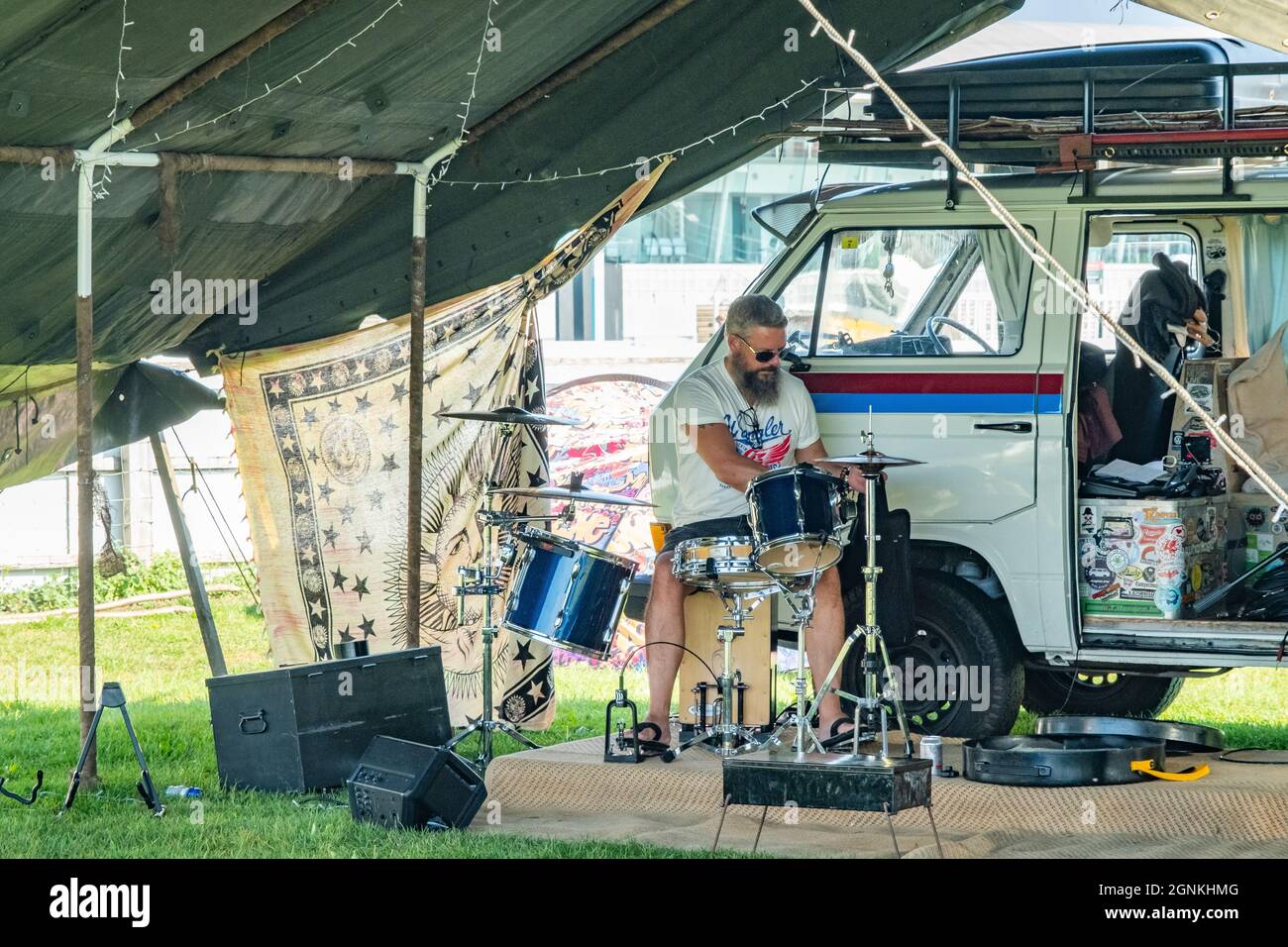 4x4 and camper van show 2021 in Stratford, Warwickshire, UK – September  2021. Drummer setting up for sound check outside his camper van before  enterta Stock Photo - Alamy