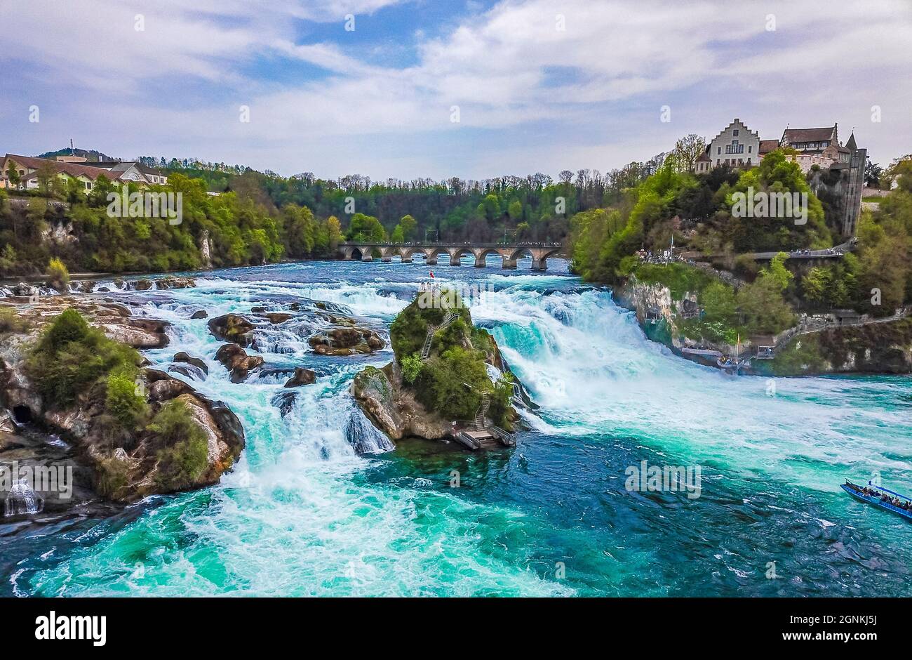 Rhine Falls Europes largest waterfall in plain in Neuhausen am Rheinfall Canton Schaffhausen Switzerland panorama view from above with drone. Stock Photo