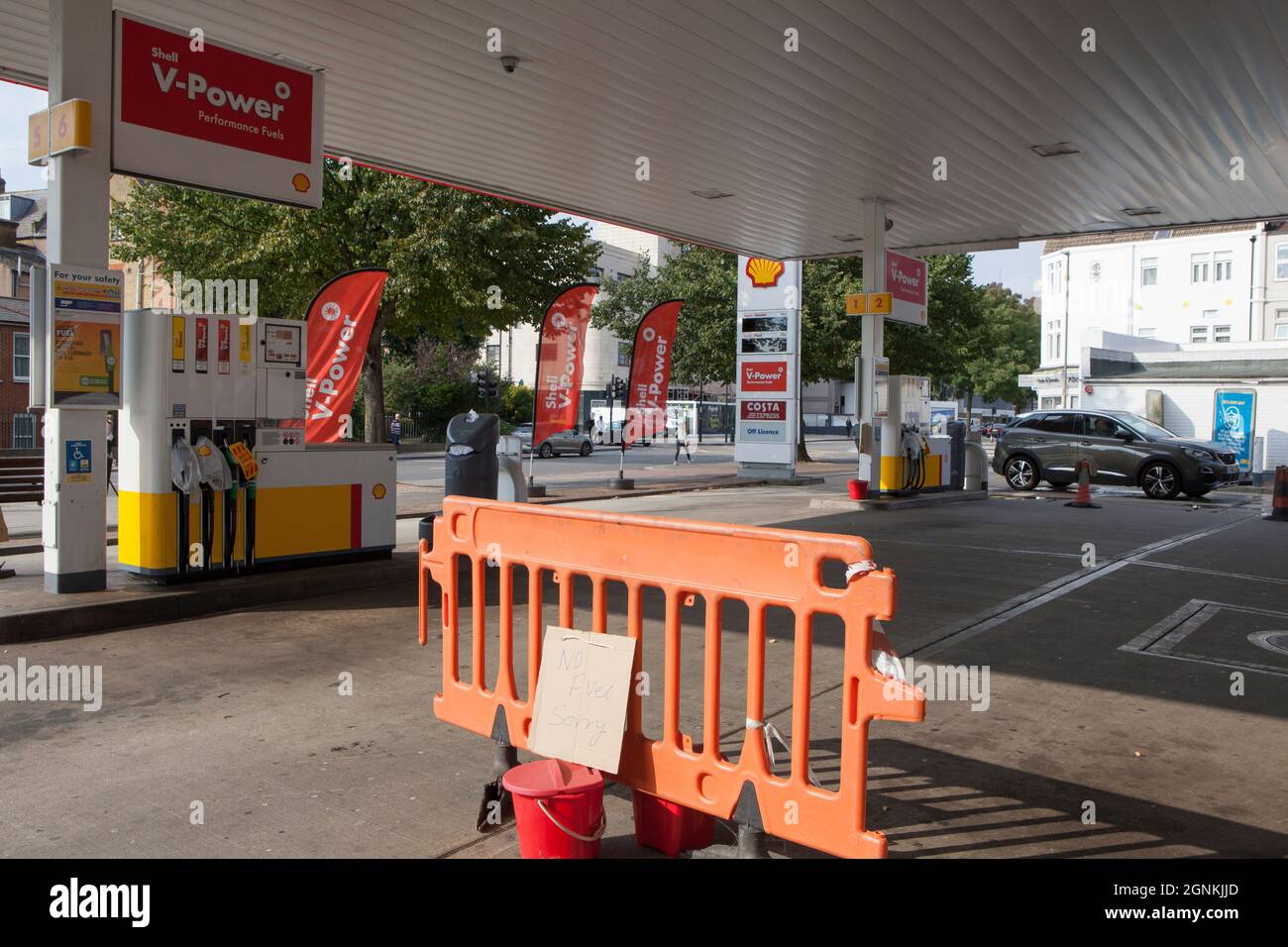 London, UK. 26th Sep, 2021. On Balham Hill in south London a Shell Garage is completely out of all types of fuel. The pumps are labelled as out of use and traffic cones have hand-written signs saying 'No Fuel Sorry'. While there is not an absolute fuel shortage in the country, the lack of delivery drivers means that some chains have run short and the subsequent panic buying has exacerbated the situation. Credit: Anna Watson/Alamy Live News Stock Photo