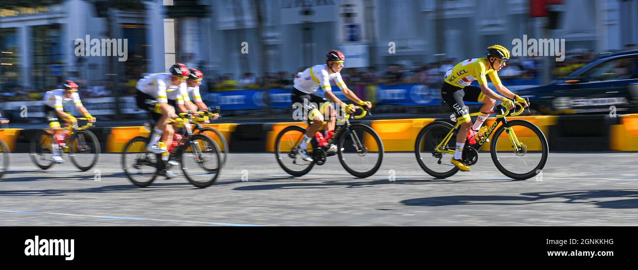 Team UAE Emirates Tadej Pogacar with the overall leader's yellow jersey during the 21st stage of the Tour de France in Paris, on July 18, 2021. Stock Photo