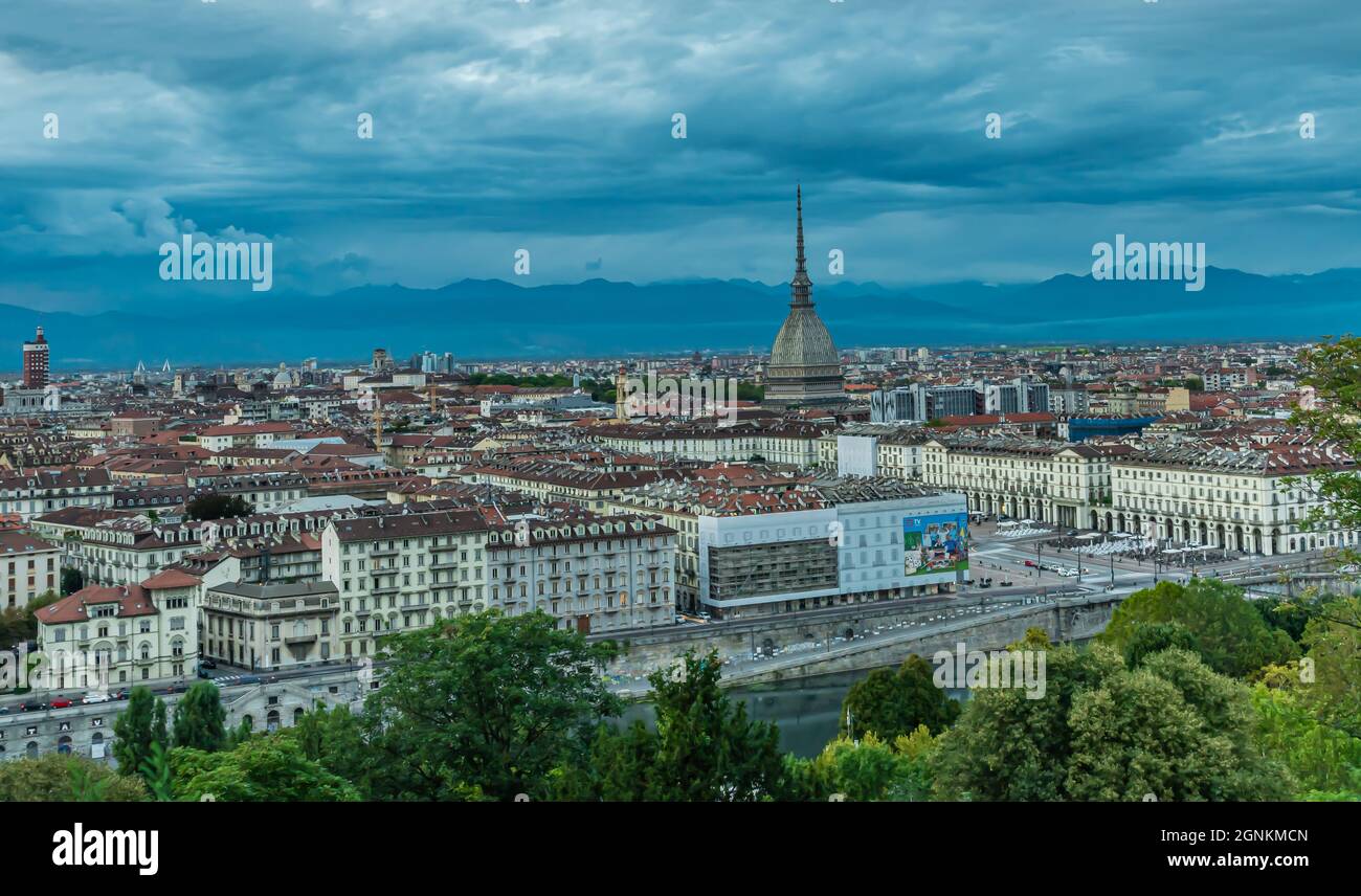 Turin is the capital of Piedmont and is known for the refinement of its architecture and cuisine. The Alps rise to the north-west of the city. Stock Photo