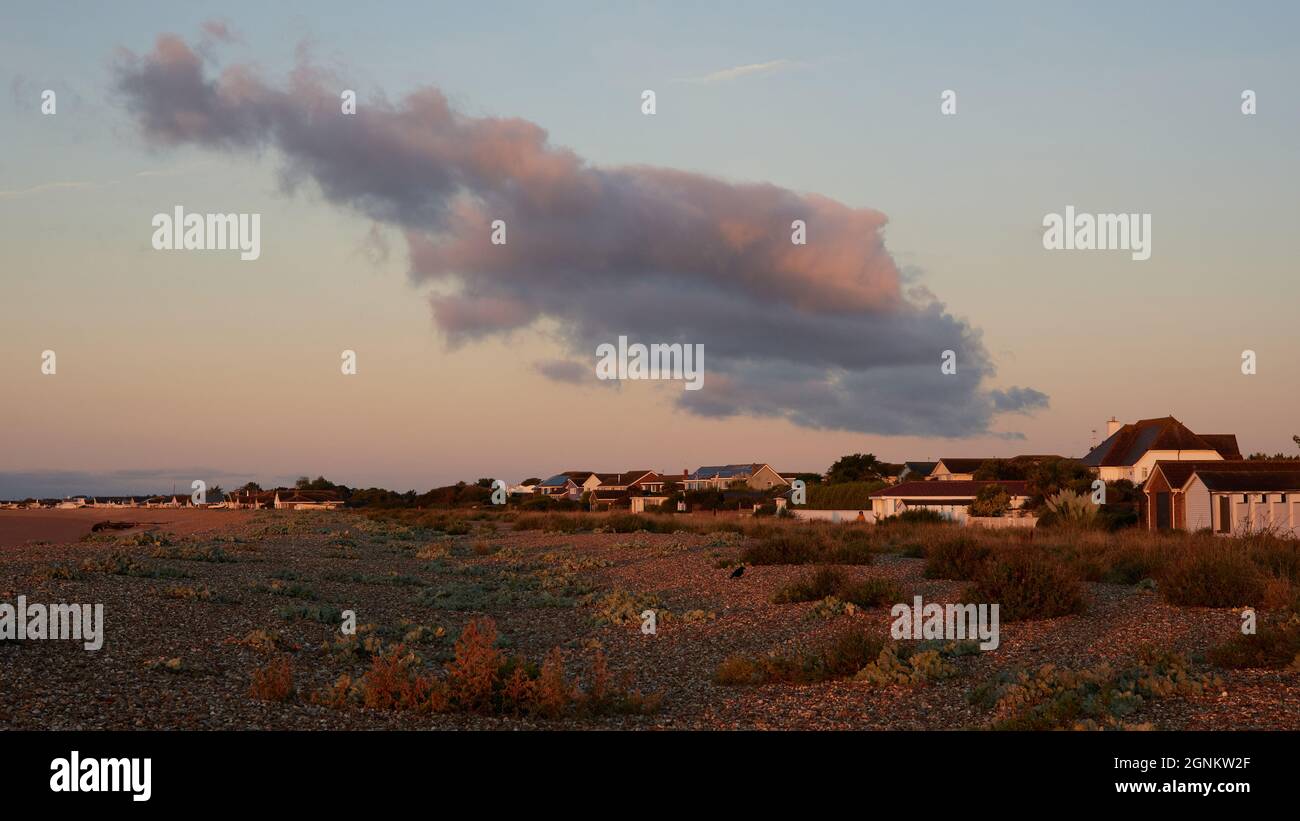 Houses on the beach edge seen in Pagham, UK Stock Photo Alamy