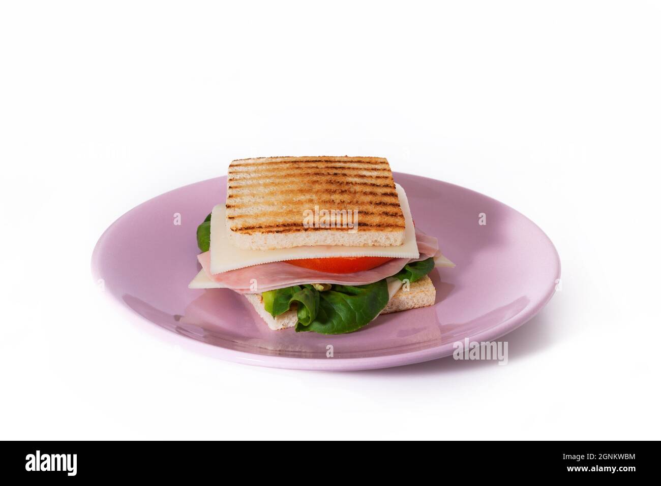 Ham, cheese and lettuce sandwich with white background. Stock Photo