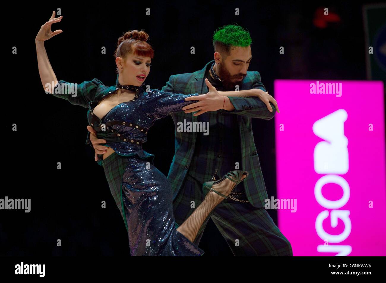 Buenos Aires, Argentina. 25th Sep, 2021. Emmanuel Casal (r) and Yanina Muzyka dance during the final round of the World Tango Championship. Credit: Florencia Martin/dpa/Alamy Live News Stock Photo