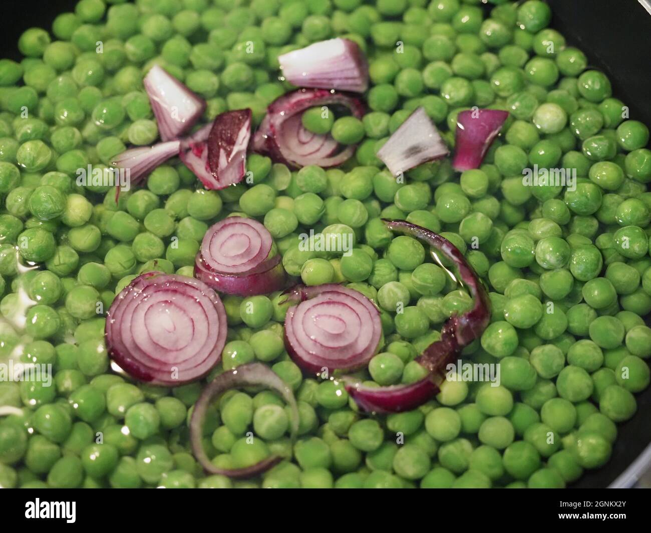 green peas (scientific name Pisum sativum) legumes vegetarian food in a