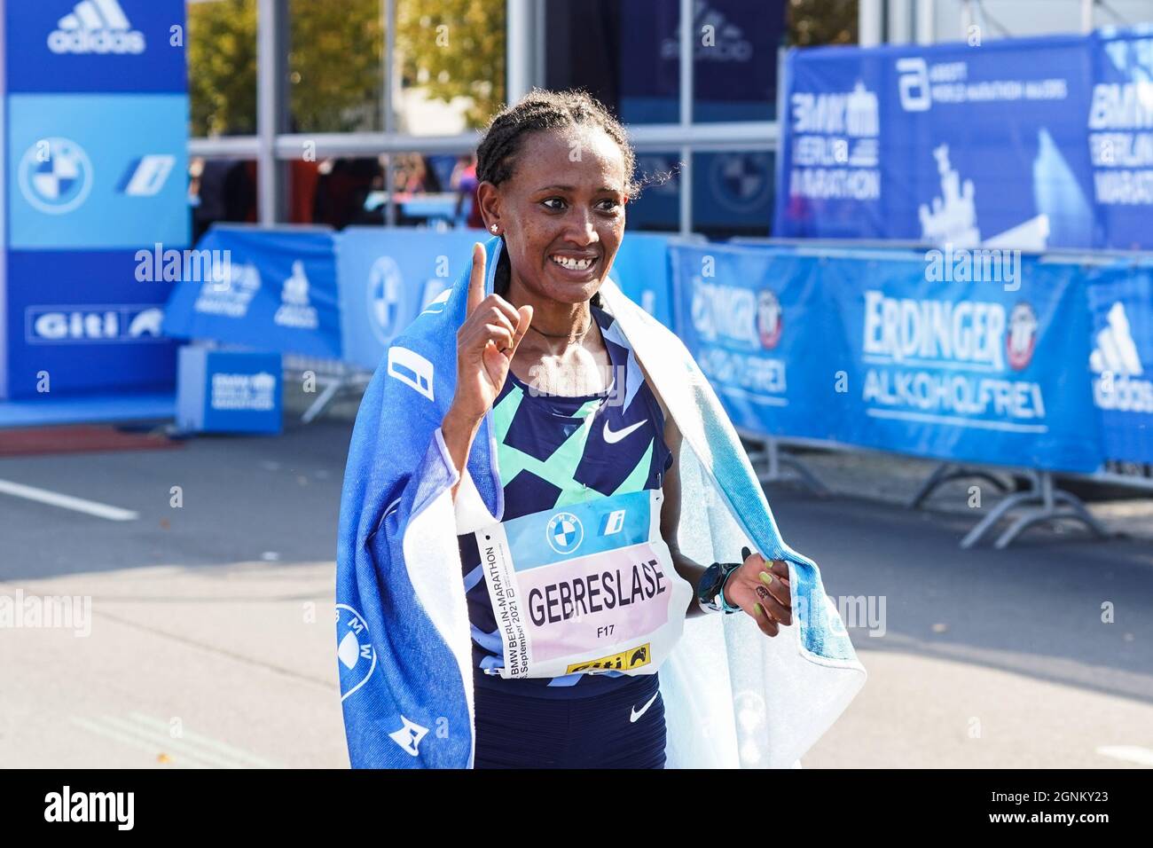 Berlin, Germany. 26th Sep, 2021. Gotytom Gebreslase of Ethiopia celebrates victory after winning the women's race of the Berlin Marathon 2021 in Berlin, capital of Germany, Sept. 26, 2021. Credit: Stefan Zeitz/Xinhua/Alamy Live News Stock Photo