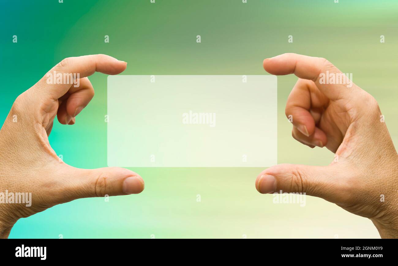 hands holding a blank tag Stock Photo