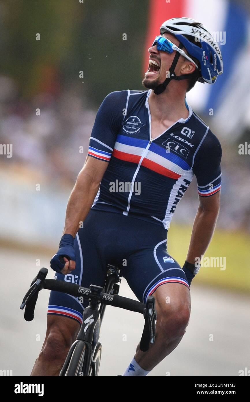 French Julian Alaphilippe celebrates as he crosses the finish line to