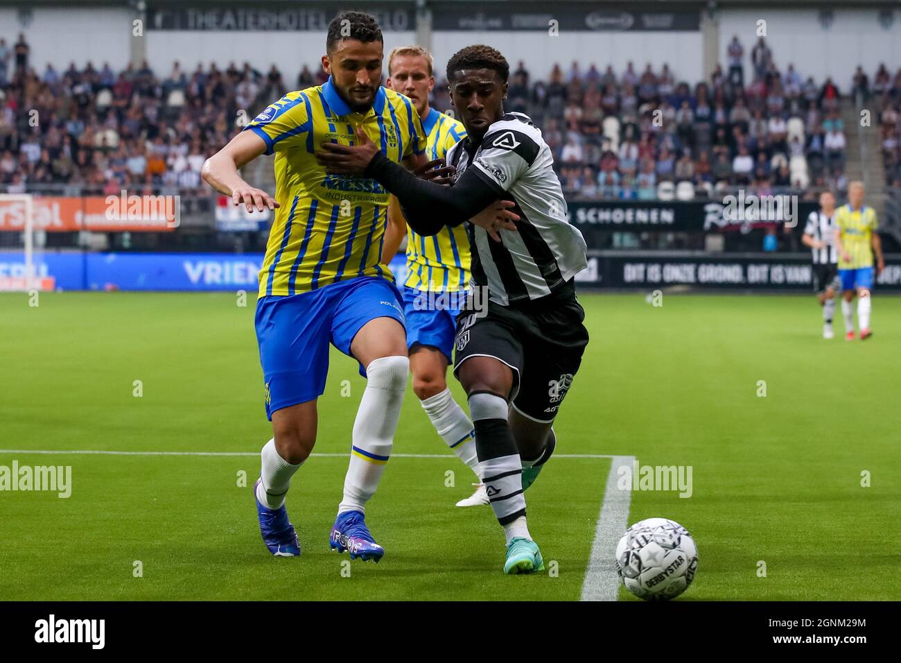 ALMELO, NETHERLANDS - SEPTEMBER 26: Ahmed Touba of RKC Waalwijk and Mohamed  Amissi of Heracles Almelo during the Dutch Eredivisie match between  Heracles Almelo and RKC Waalwijk at the Erve Asito on
