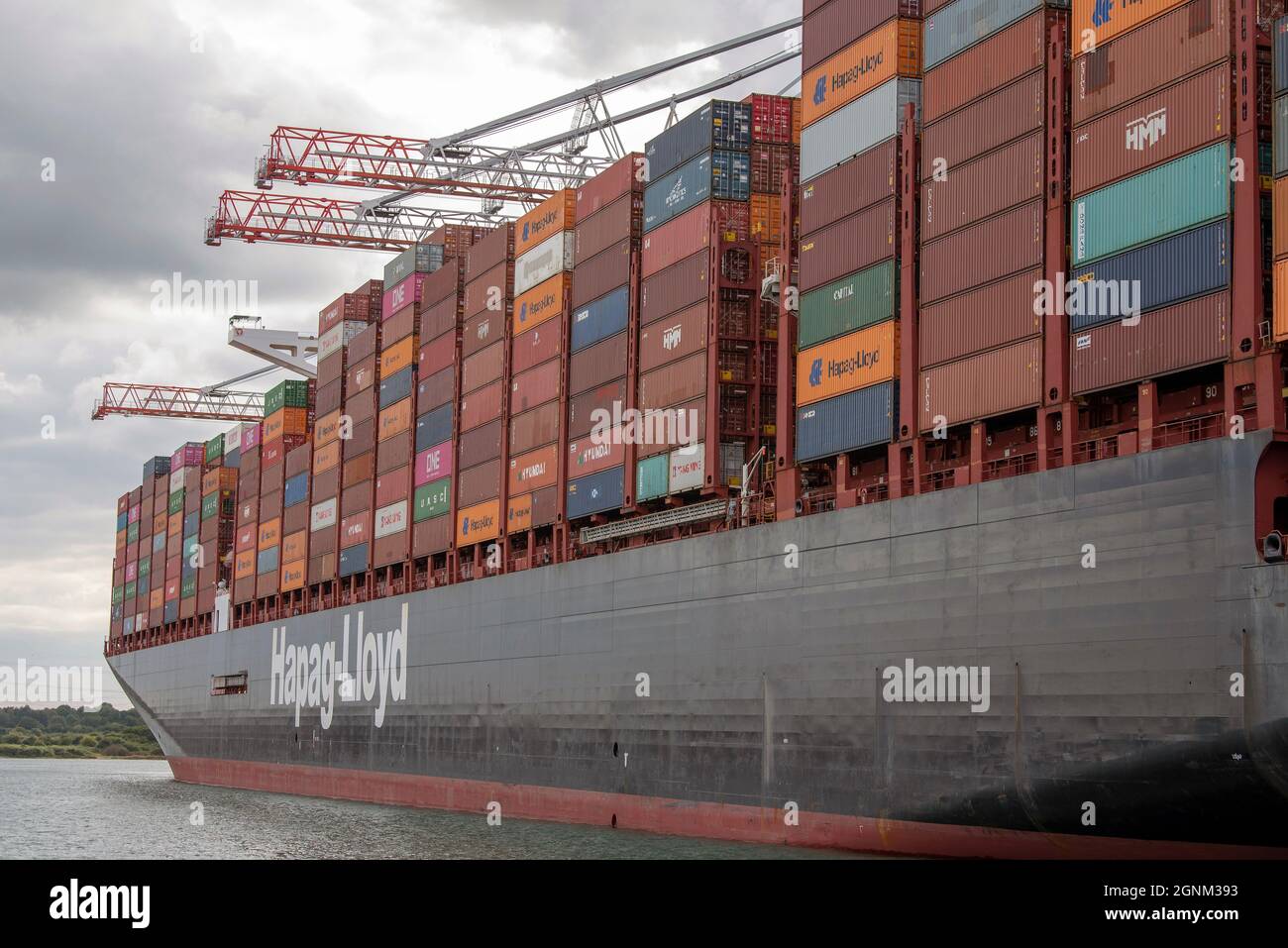 Southampton, England, UK. 2021.  Shipping containers stacked on a container ship alongside in a deep water port. Stock Photo