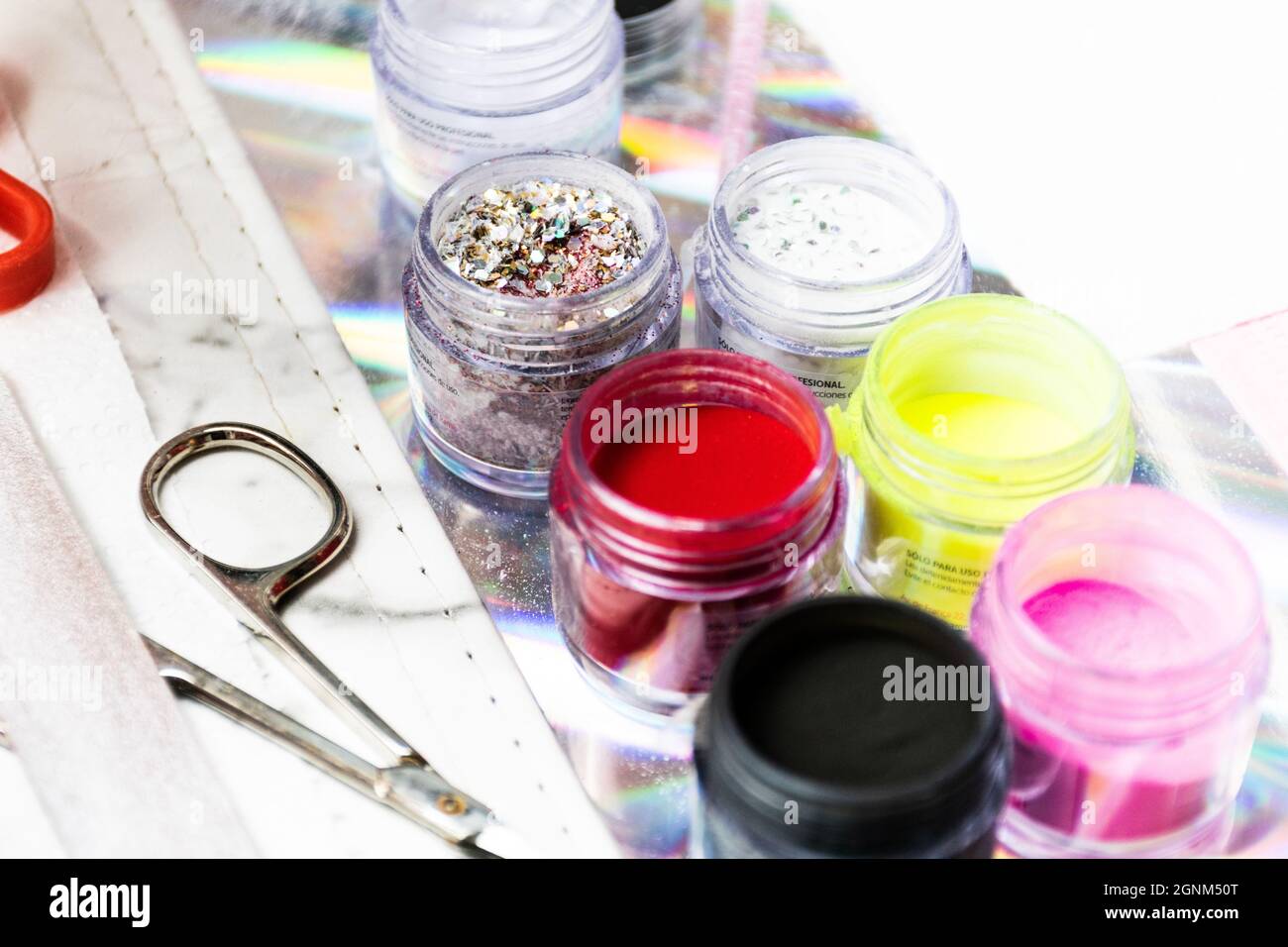 Set of professional manicure tools on table. Stock Photo