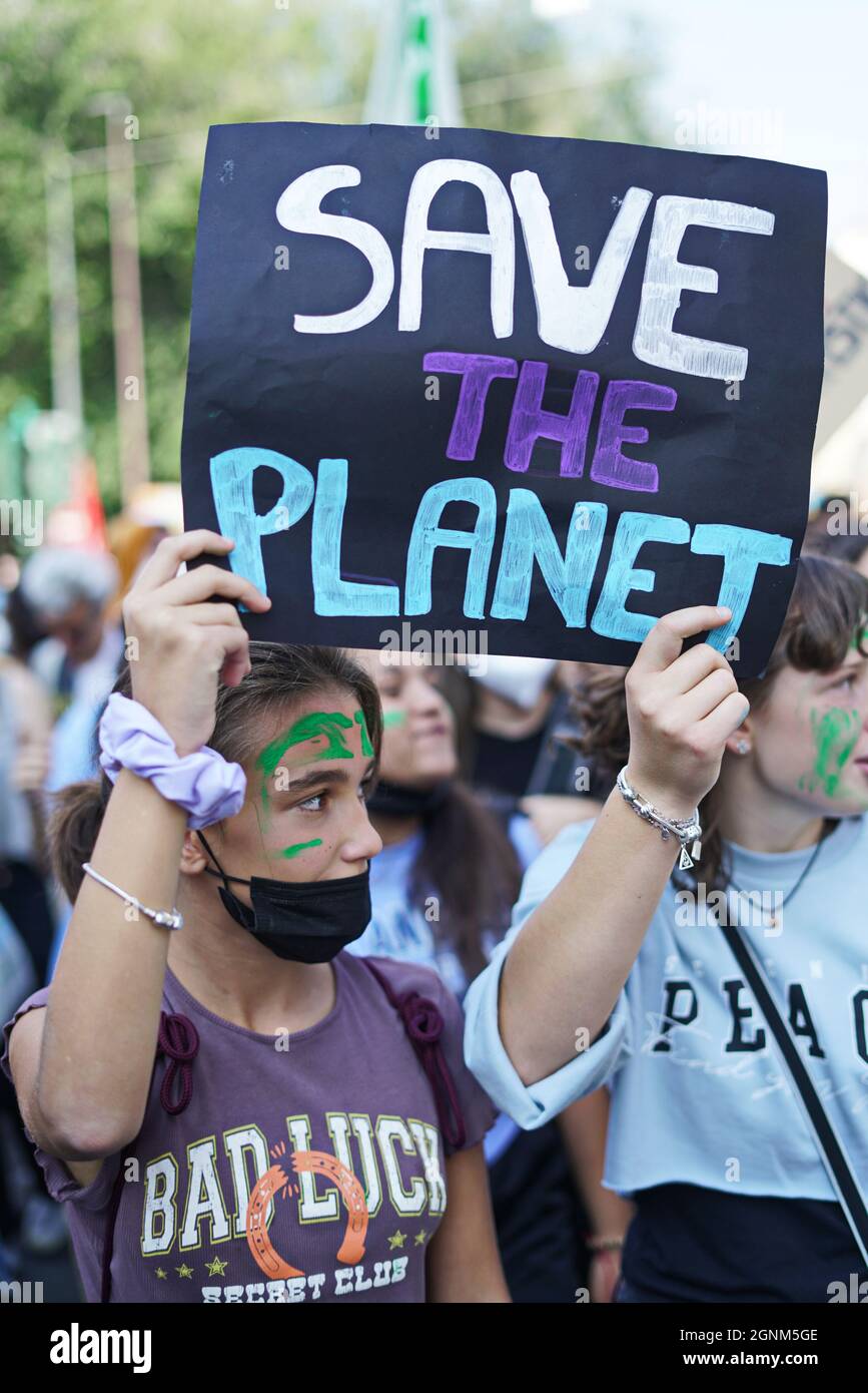 Movement Friday for the Future. Young protesters holding placards during the strike march. Turin, Italy - September 2021 Stock Photo