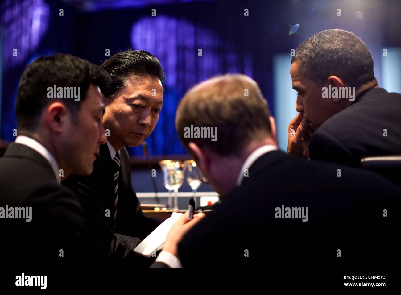 President Barack Obama talks with Prime Minister Yukio Hatoyama of Japan, during a working dinner for Heads of Delegation at the Nuclear Security Summit at the Walter E. Washington Convention Center in Washington, D.C., April 12, 2010. (Official White House Photo by Pete Souza) This official White House photograph is being made available only for publication by news organizations and/or for personal use printing by the subject(s) of the photograph. The photograph may not be manipulated in any way and may not be used in commercial or political materials, advertisements, emails, products, promot Stock Photo