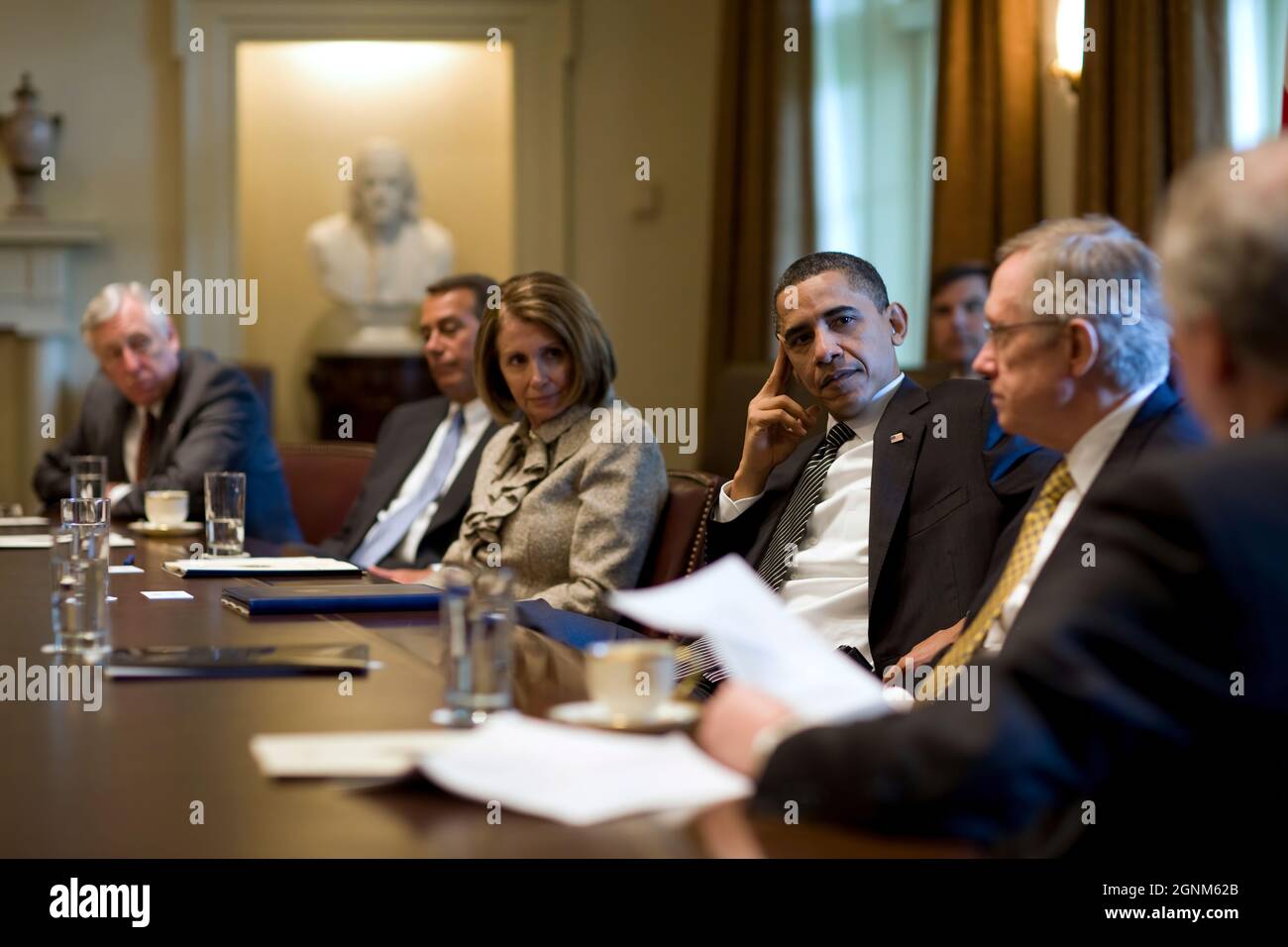 President Barack Obama meets with bipartisan leaders of the House and Senate, including from left, House Majority Leader Steny Hoyer, D-Md., House Republican Leader John A. Boehner, R-Ohio, Speaker of the House Nancy Pelosi, D-Calif., Senate Majority Leader Harry Reid, D-Nev., and Senate Republican Leader Mitch McConnell, R-Ky., to discuss Wall Street reform, in the Cabinet Room of the White House, April 14, 2010. (Official White House Photo by Pete Souza) This official White House photograph is being made available only for publication by news organizations and/or for personal use printing by Stock Photo