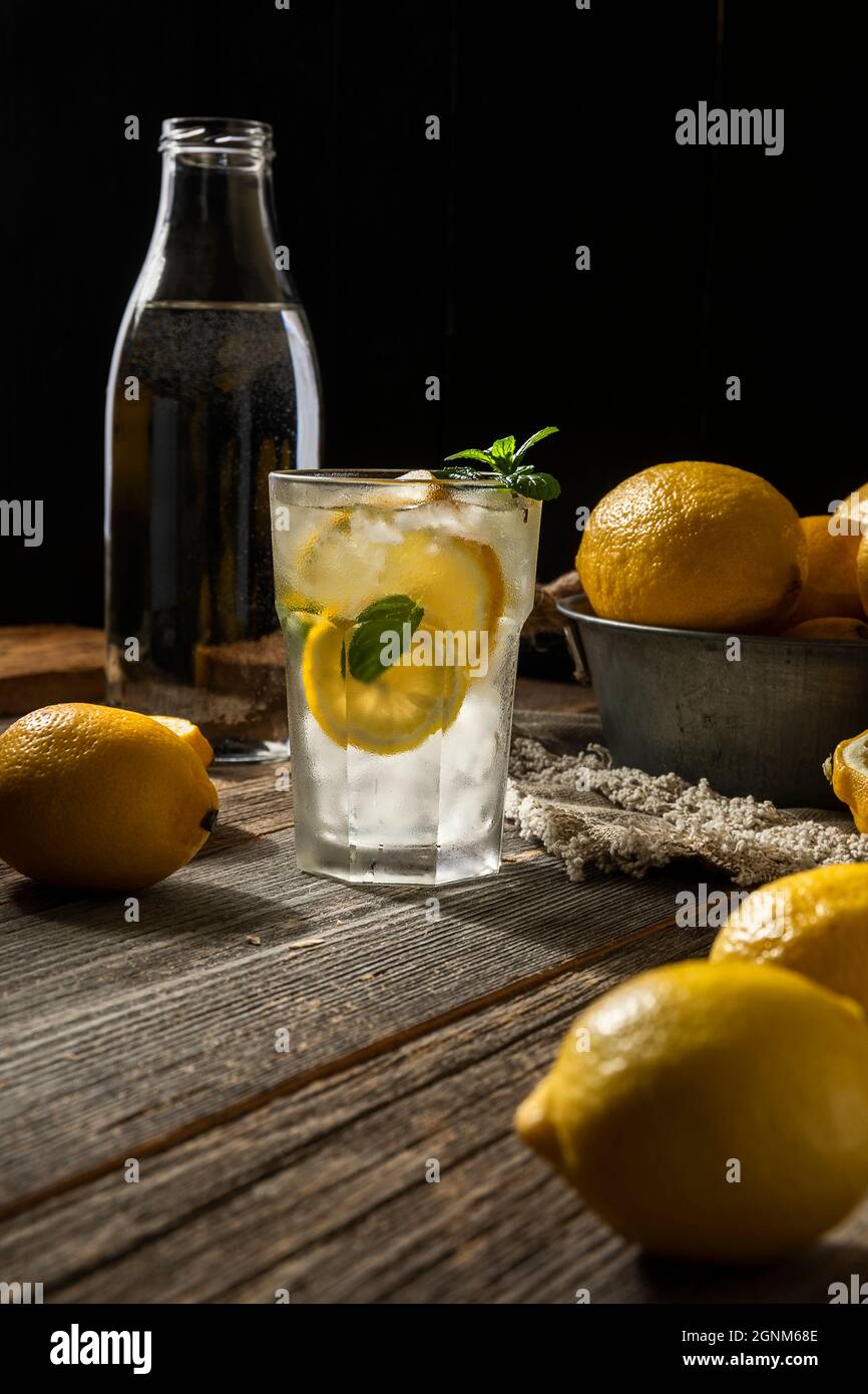 lemon ice cocktail on wooden background indoors Stock Photo