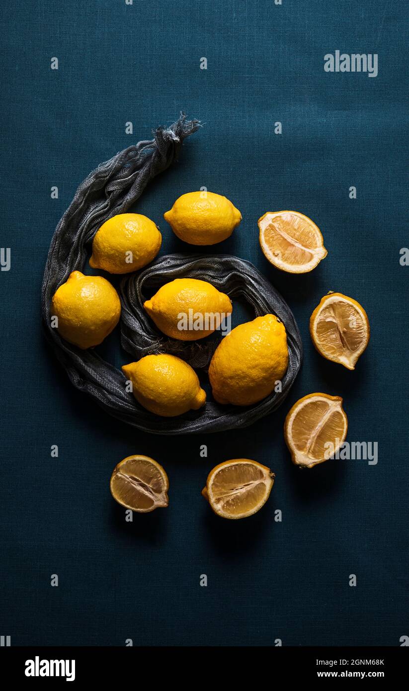 lemons close up on blue background, indoor Stock Photo