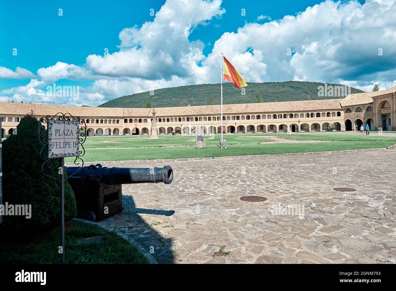 Jaca, Huesca September 10, 2021, Poster 'Plaza Felipe II' with a cannon and the Spanish flag in the background in the citadel of Jaca, military fortif Stock Photo