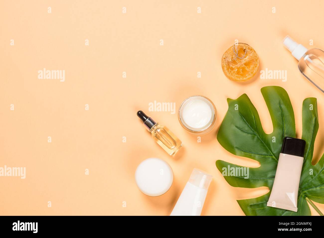 Spa and wellness products at trendy beige background. Stock Photo