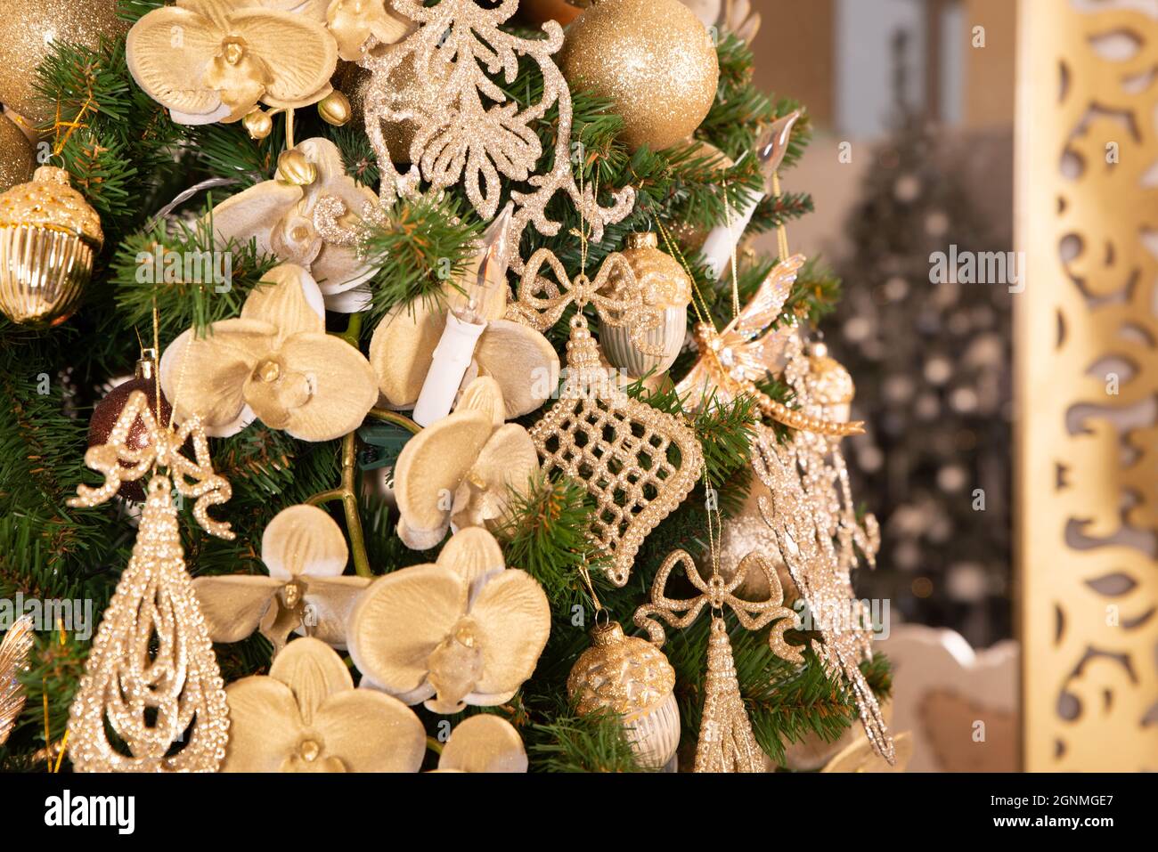 christmas tree with gold decorations close-up Stock Photo