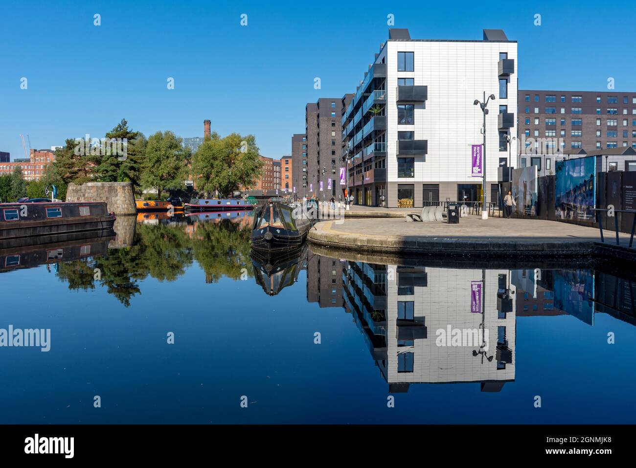 The Mansion House and Cotton Field Wharf apartment blocks reflected in