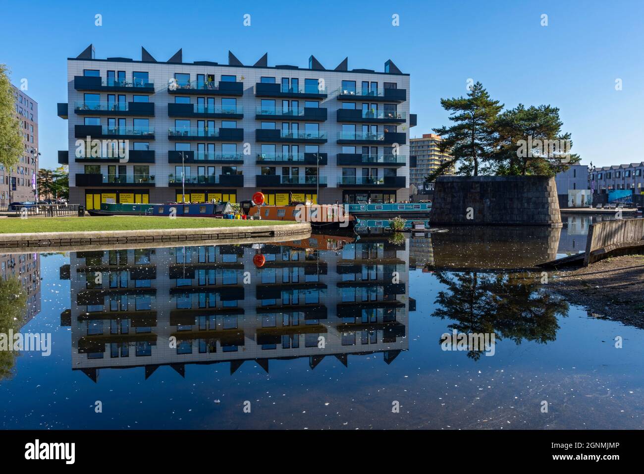 The Mansion House apartment block, from the Cotton Field Park marina