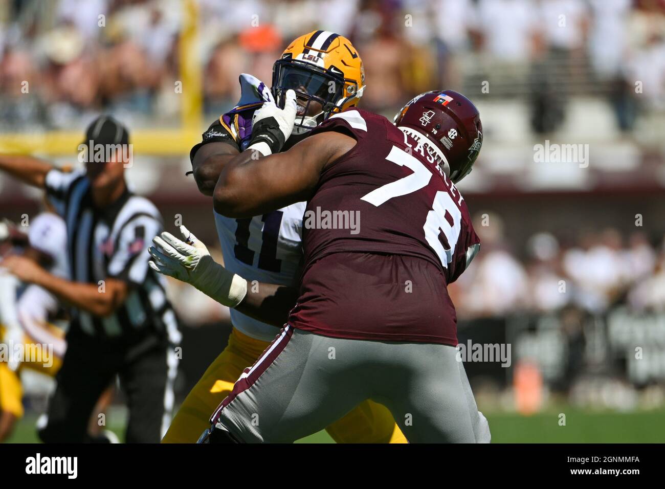Starkville, MS, USA. 25th Sep, 2021. LSU Tigers defensive end Ali Gaye (11) and Mississippi State Bulldogs offensive lineman Scott Lashley (78) in action during the NCAA football game between the LSU Tigers and the Mississippi State Bulldogs at Davis Wade Stadium in Starkville, MS. Kevin Langley/CSM/Alamy Live News Stock Photo