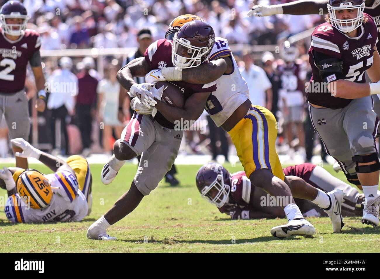 Starkville, MS, USA. 25th Sep, 2021. Mississippi State Bulldogs running back Jo'quavious Marks (7) runs the ball and is met by LSU Tigers linebacker Damone Clark (18) during the NCAA football game between the LSU Tigers and the Mississippi State Bulldogs at Davis Wade Stadium in Starkville, MS. Kevin Langley/CSM/Alamy Live News Stock Photo