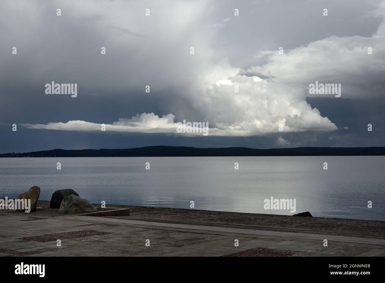 embankment of Lake Onega in the city of Petrozavodsk, Russia, expressive clouds above the water Stock Photo
