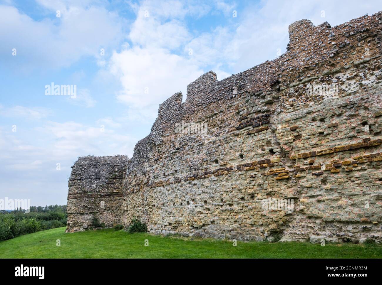 The roman walls on the west side of Anderida the Roman name for Pevensey Castle, Pevensey, East Sussex, UK. Stock Photo