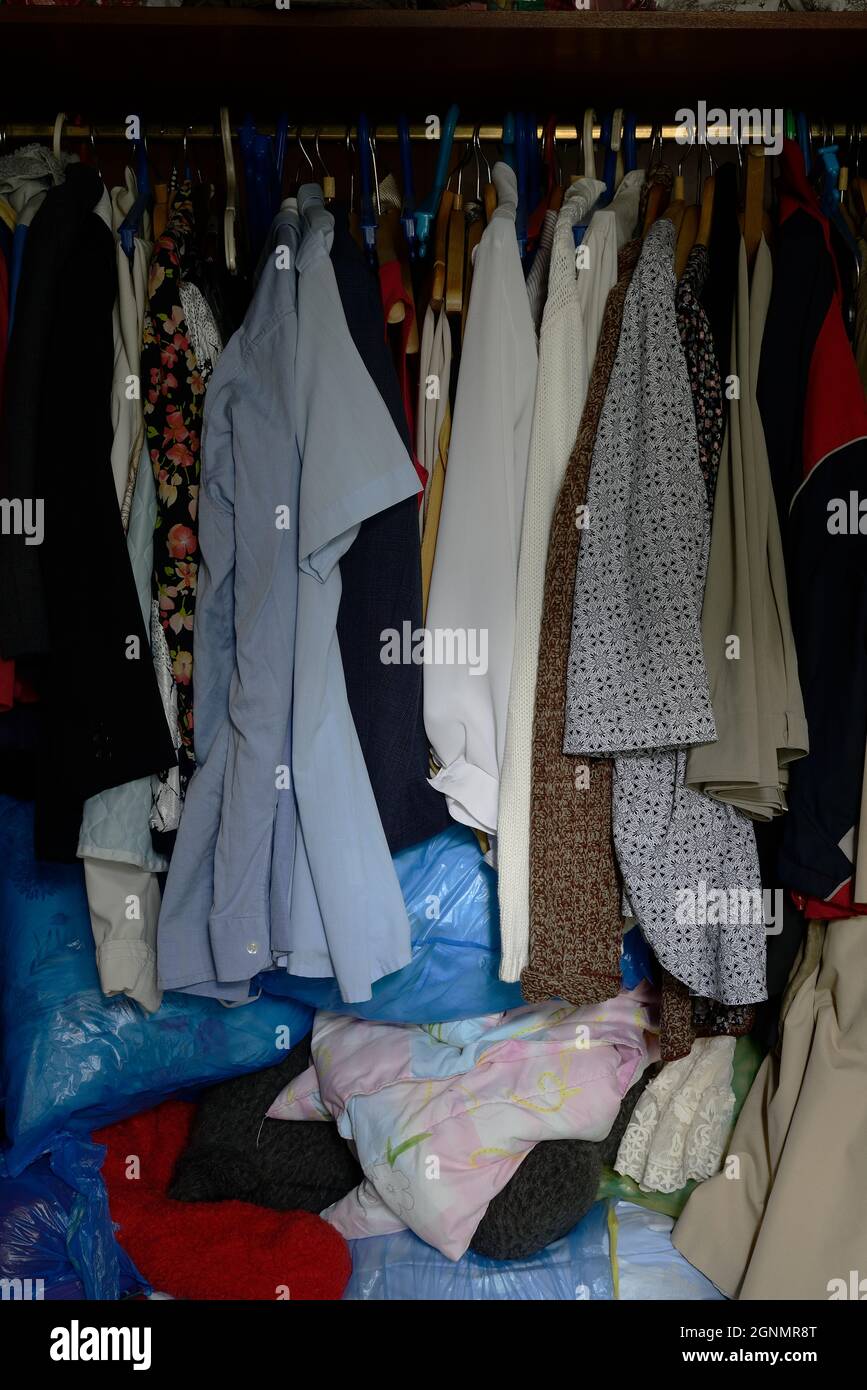 A Lot Of Old Different Clothes In The Wardrobe Stock Photo Alamy