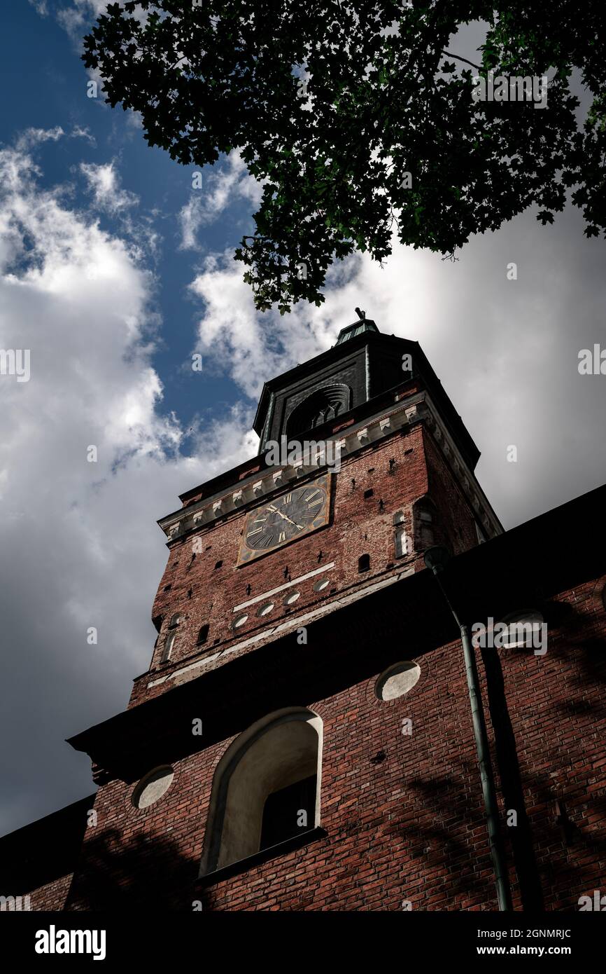The beautiful architectural details of Turku Cathedral in Turku, Finland against a gloomy sky Stock Photo