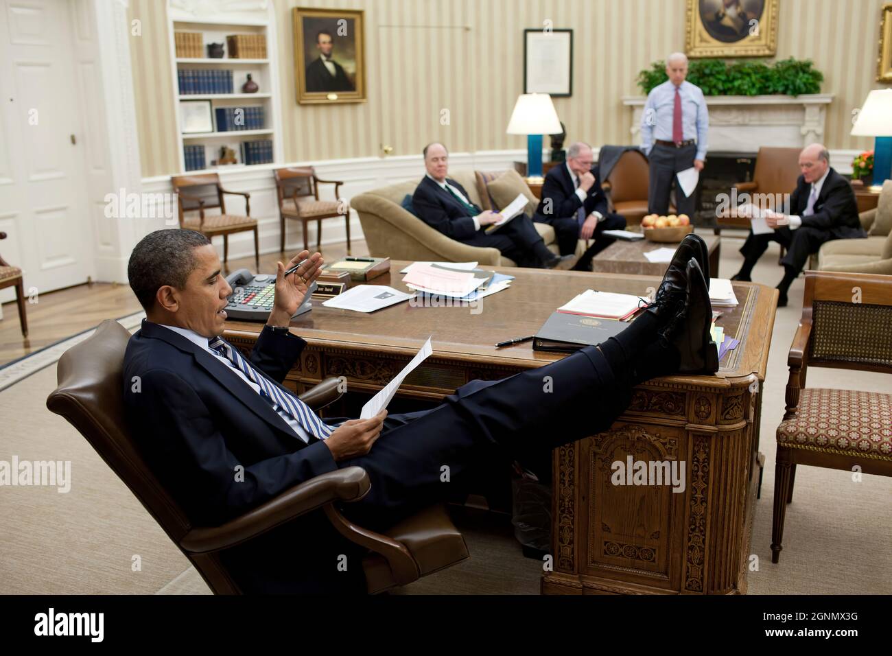 President Barack Obama and Vice President Joe Biden discuss the latest developments on the situation in Egypt with National Security Advisor Tom Donilon; John Brennan, Assistant to the President for Homeland Security and Counterterrorism; and Chief of Staff Bill Daley  in the Oval Office, Feb. 10, 2011. (Official White House Photo by Pete Souza) This official White House photograph is being made available only for publication by news organizations and/or for personal use printing by the subject(s) of the photograph. The photograph may not be manipulated in any way and may not be used in commer Stock Photo