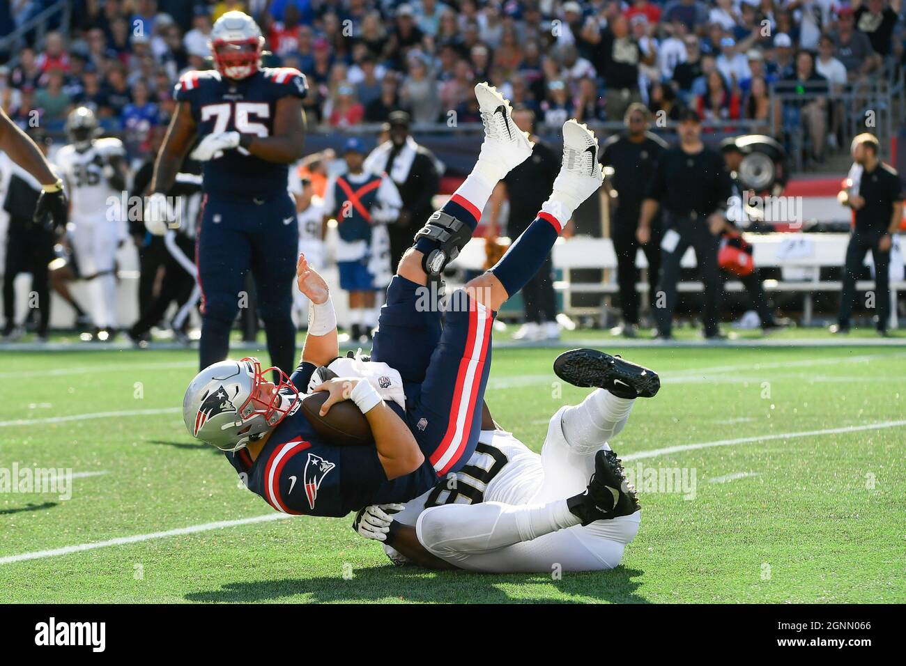 Sunday, September 26, 2021: New England Patriots quarterback Mac Jones (10)  gets sacked by New Orleans Saints defensive end Tanoh Kpassagnon (90)  during the NFL football game between the New Orleans Saints