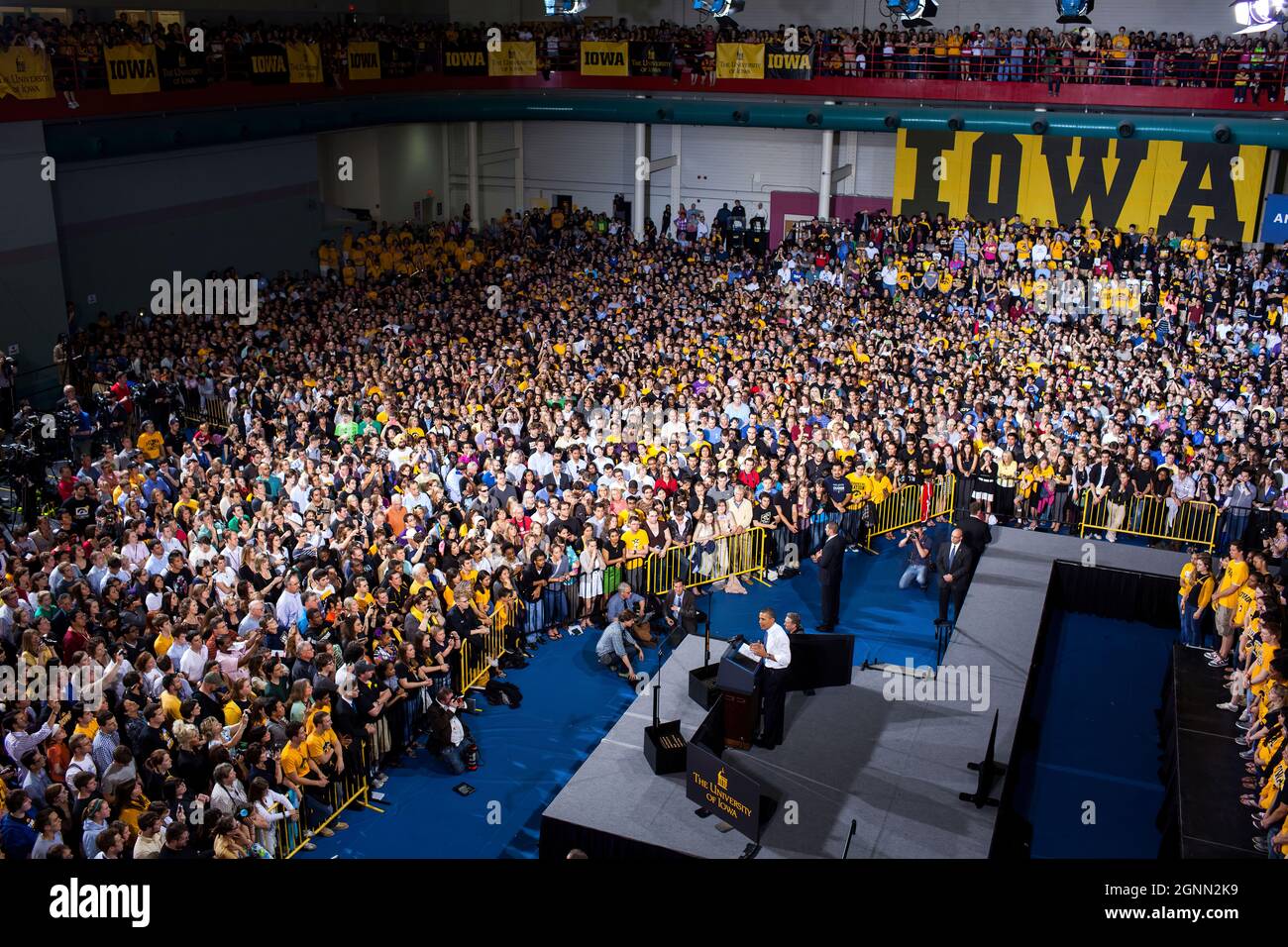 President Barack Obama delivers remarks on student loan interest rates, at the University of Iowa Field House, Iowa City, Iowa, April 25, 2012. (Official White House Photo by Pete Souza) This official White House photograph is being made available only for publication by news organizations and/or for personal use printing by the subject(s) of the photograph. The photograph may not be manipulated in any way and may not be used in commercial or political materials, advertisements, emails, products, promotions that in any way suggests approval or endorsement of the President, the First Family, or Stock Photo