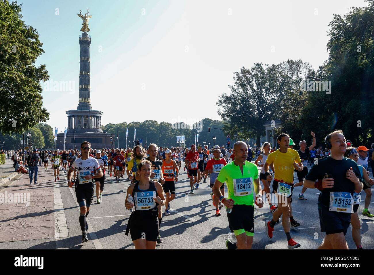 Participants race during the BMW BERLINMARATHON 2021 at Bundesstrasse